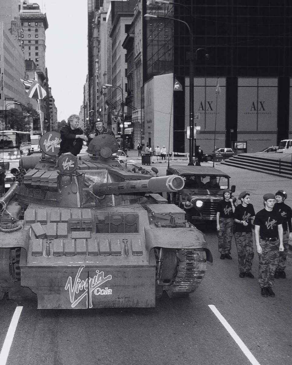 Richard Branson in a tank in Times Square launching Virgin Cola.